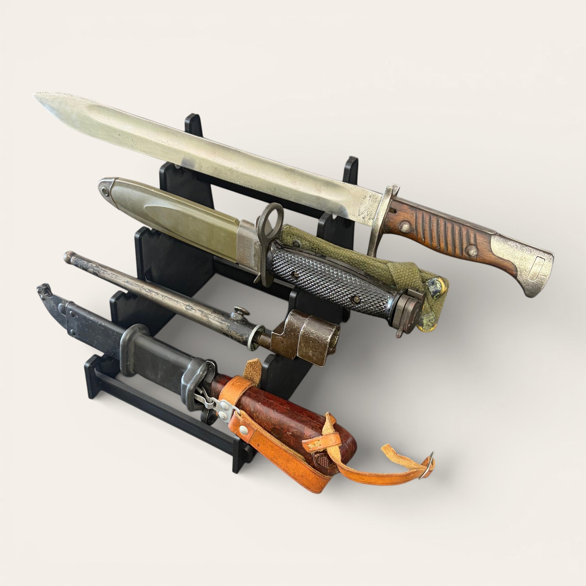 Universal display stand for weapons and collectibles